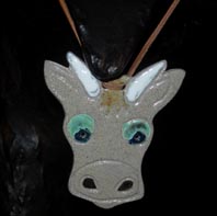 vache en pendentif