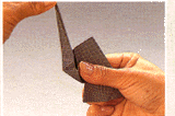 16 origami - aplatir la trompe en pressant les pliures.
